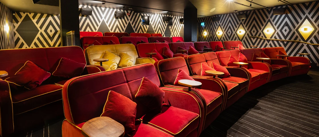 Comfy seats and mid-movie drinks service are commonplace at Everyman   Source: Company