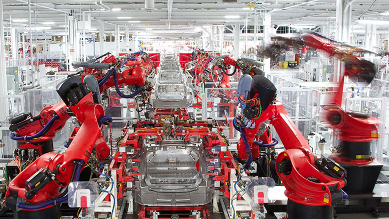 Blame it on the 'bots: Tesla's Musk says Model 3 production lagging on ...