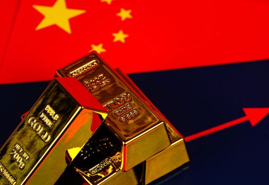 China flag, gold bars