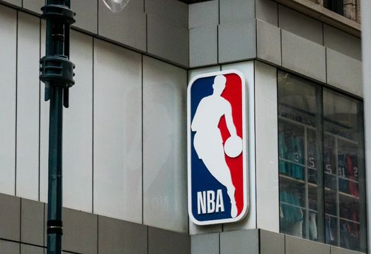 Warner Bros Discovery Inc - Warner Bros climbs as settlement reached with NBA