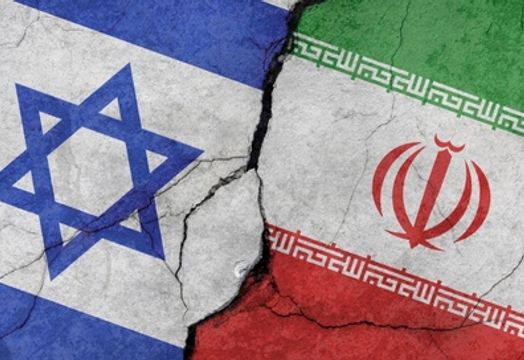 Israel and Iran flags on cracked stone