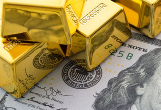 Gold bars on US dollars