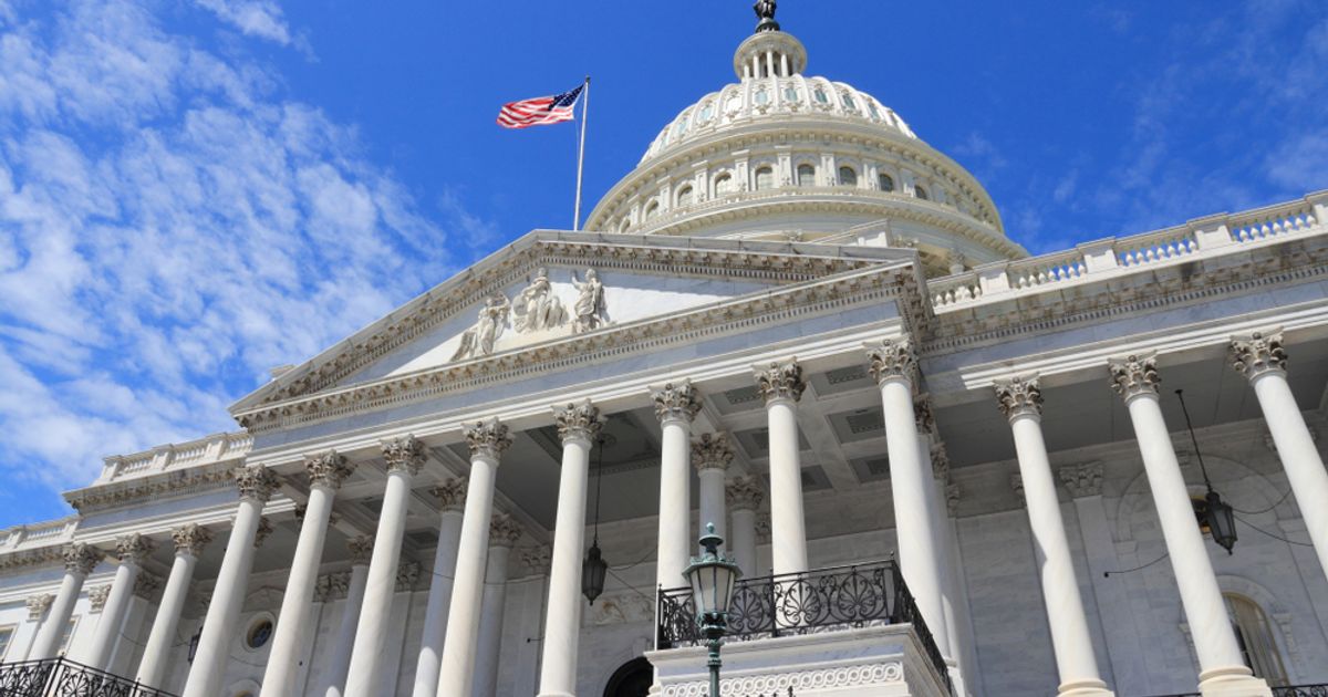 Nasdaq ends session on high note, carrying Dow and S&P along for...