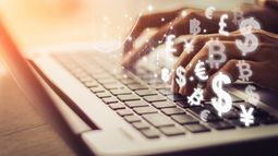 businesswoman-uses-laptop-computer-world-currencies-bitcoin-wallet-cryptocurrency-on-virtual-screen