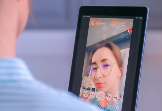 Woman using Snapchat