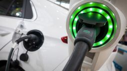 electric vehicle hooked up to charger