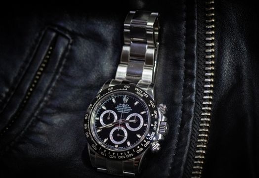 Rolex on leather jacket