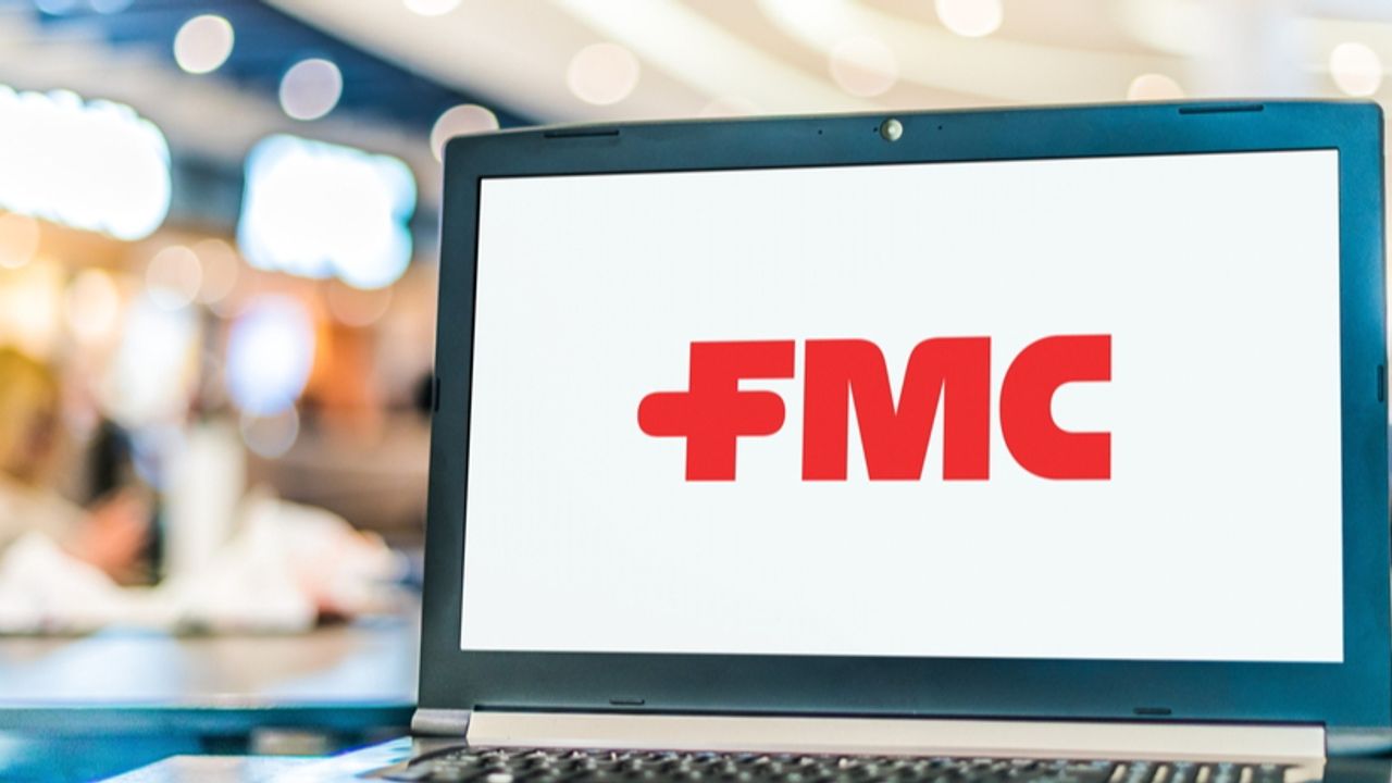 FMC plunges on slashed revenue forecasts