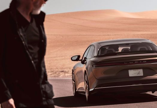 Lucid car and person