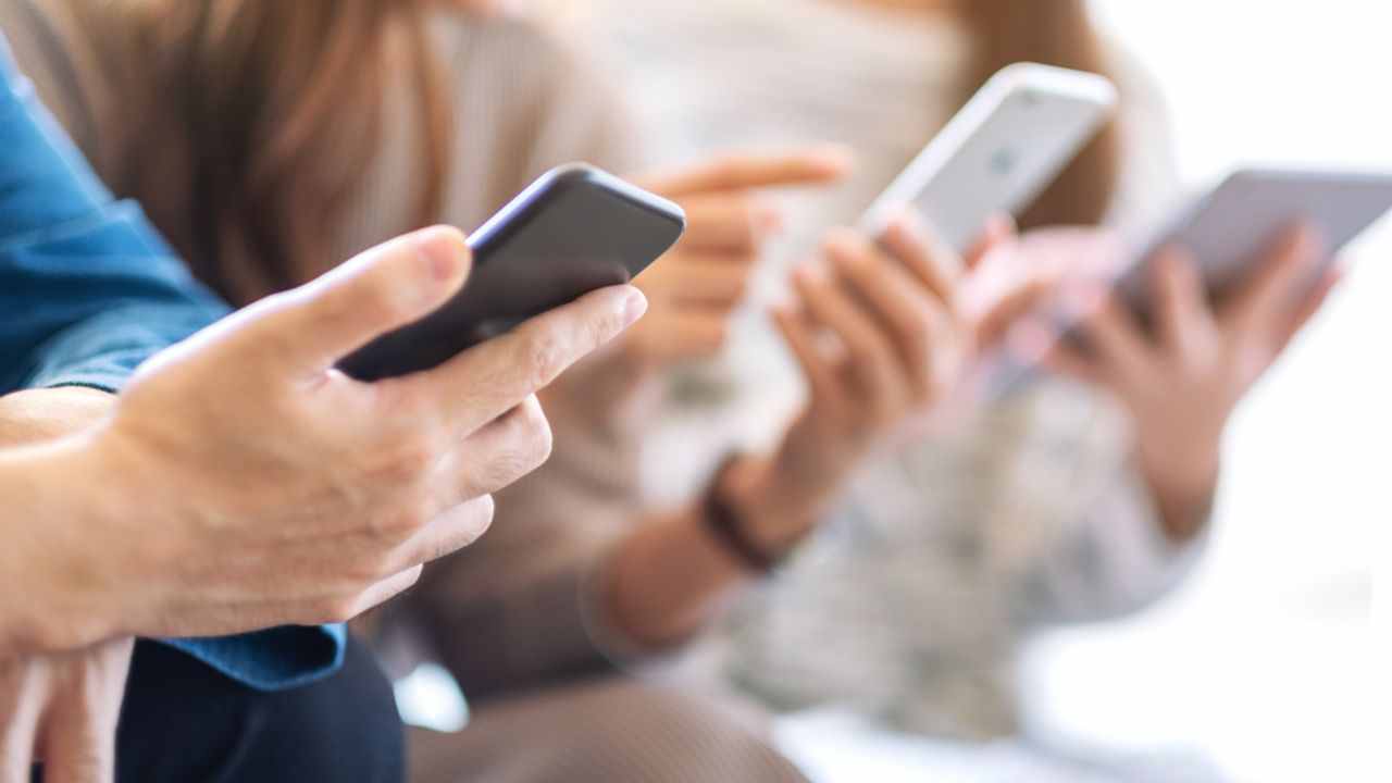 People holding phones
