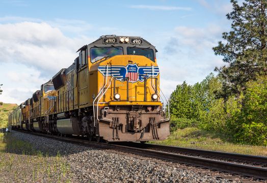 Union Pacific freight train running along the south side of the Columbia Gorge in Oregon