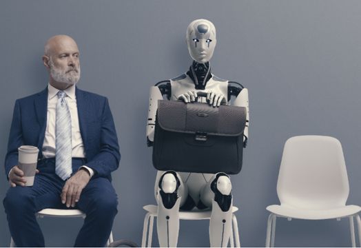 Person next to robot with briefcase