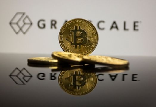 Bitcoin in front of Grayscale logo